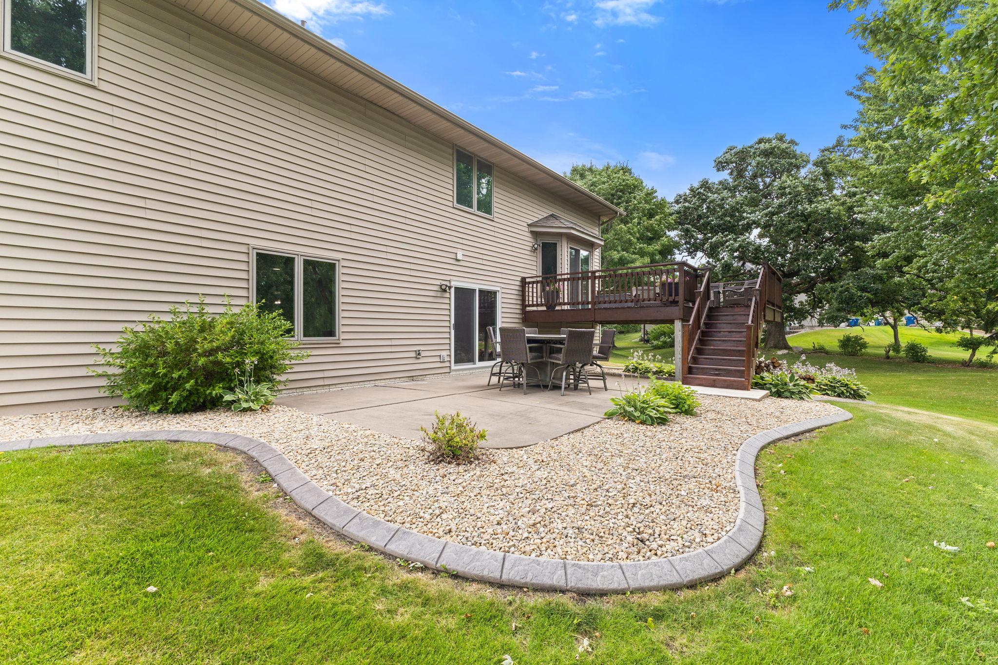 Beautiful updated landscaping with concrete edging creates a peaceful setting you'll enjoy all season long.