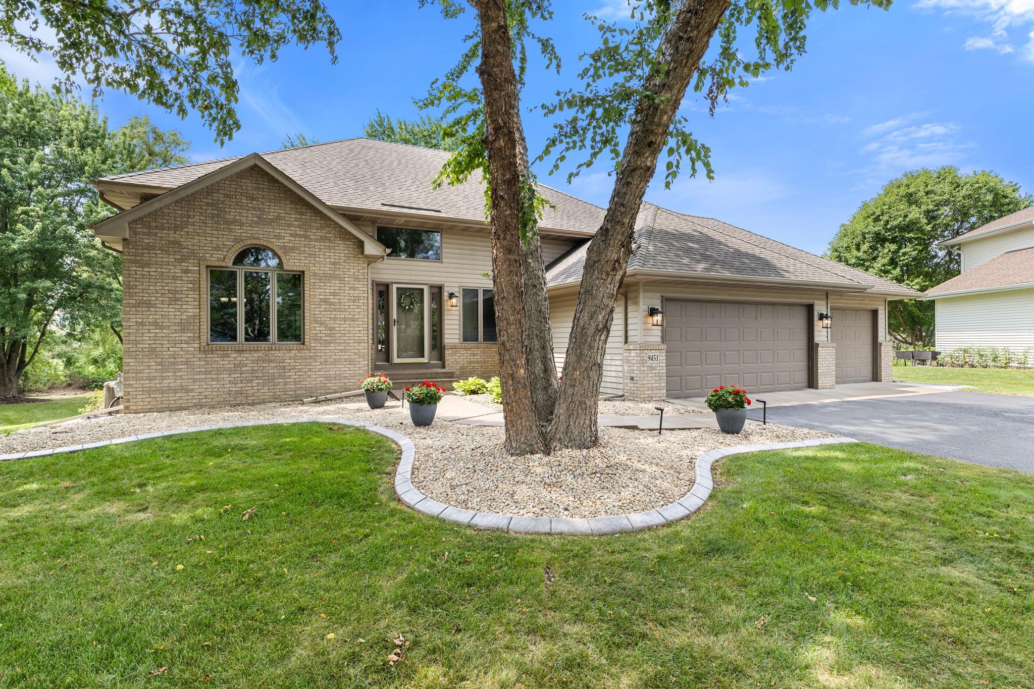 A timeless exterior with mature landscaping that has been lovingly maintained.