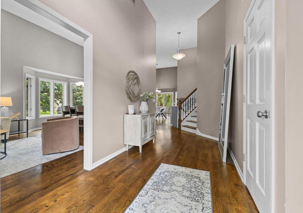 Gleaming hardwood flooring and thoughtfully designed spaces flow seamlessly from room to room.