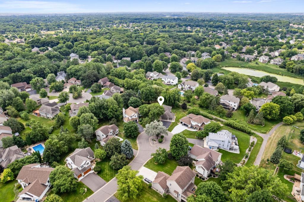 Tucked among mature trees in one of Champlin's most sought-after neighborhoods. Enjoy the beautiful walking trails throughout this neighborhood.