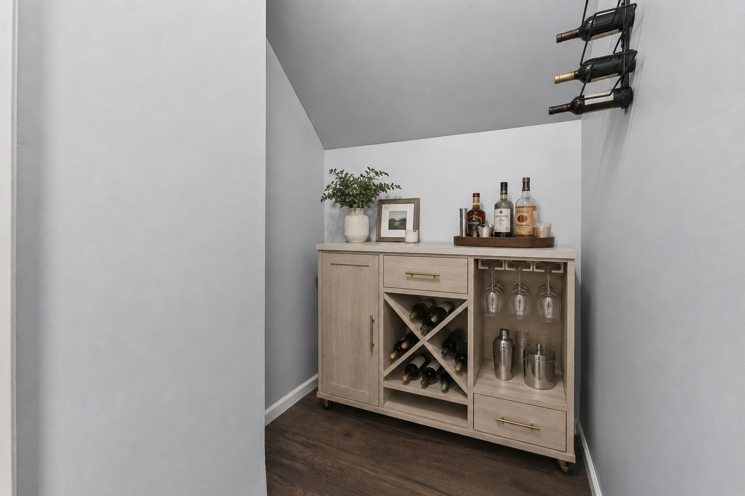 Lower level closet was being used as a wine cellar/ bar cart. Image has been virtually staged.