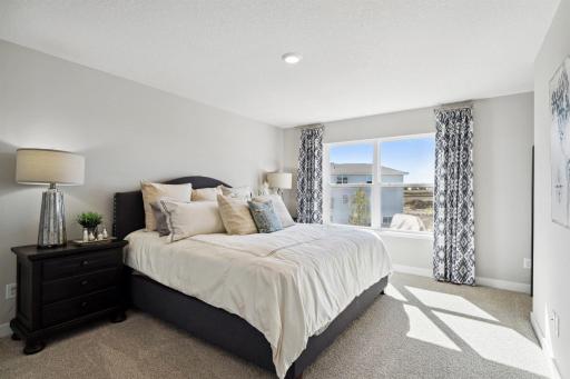 Now THAT is a primary bedroom, and the perfect setting to start and finish each day! Photo of model, colors and options will vary.