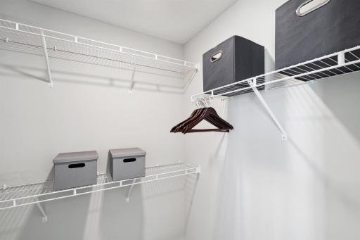 One of TWO walk-in closets in primary. Photo of model, colors and options will vary.