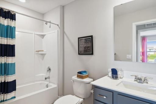 Full bath located on upper-level. Photo of model, colors and options will vary.