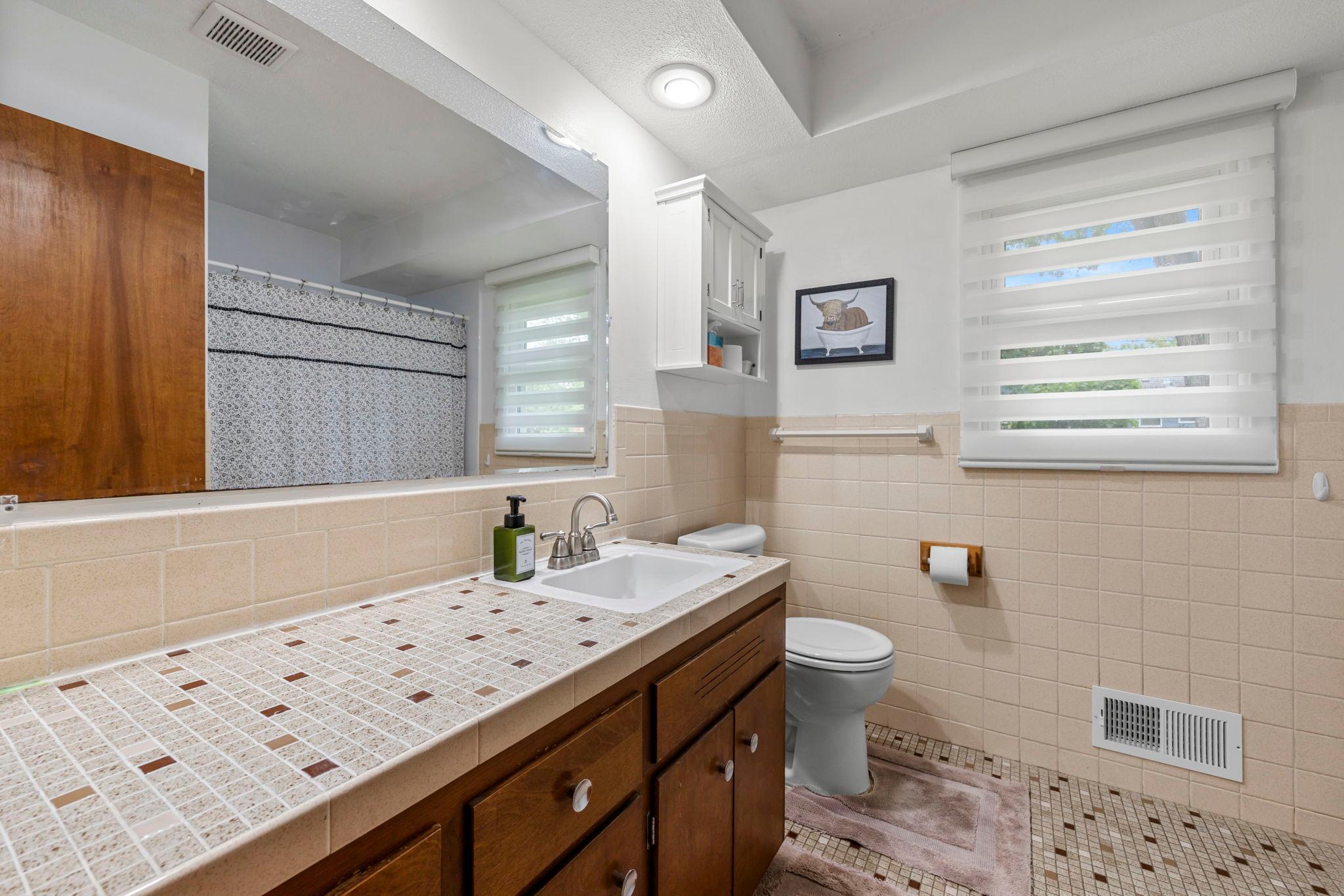Full vintage bath upstairs with refreshed faucet & toilet