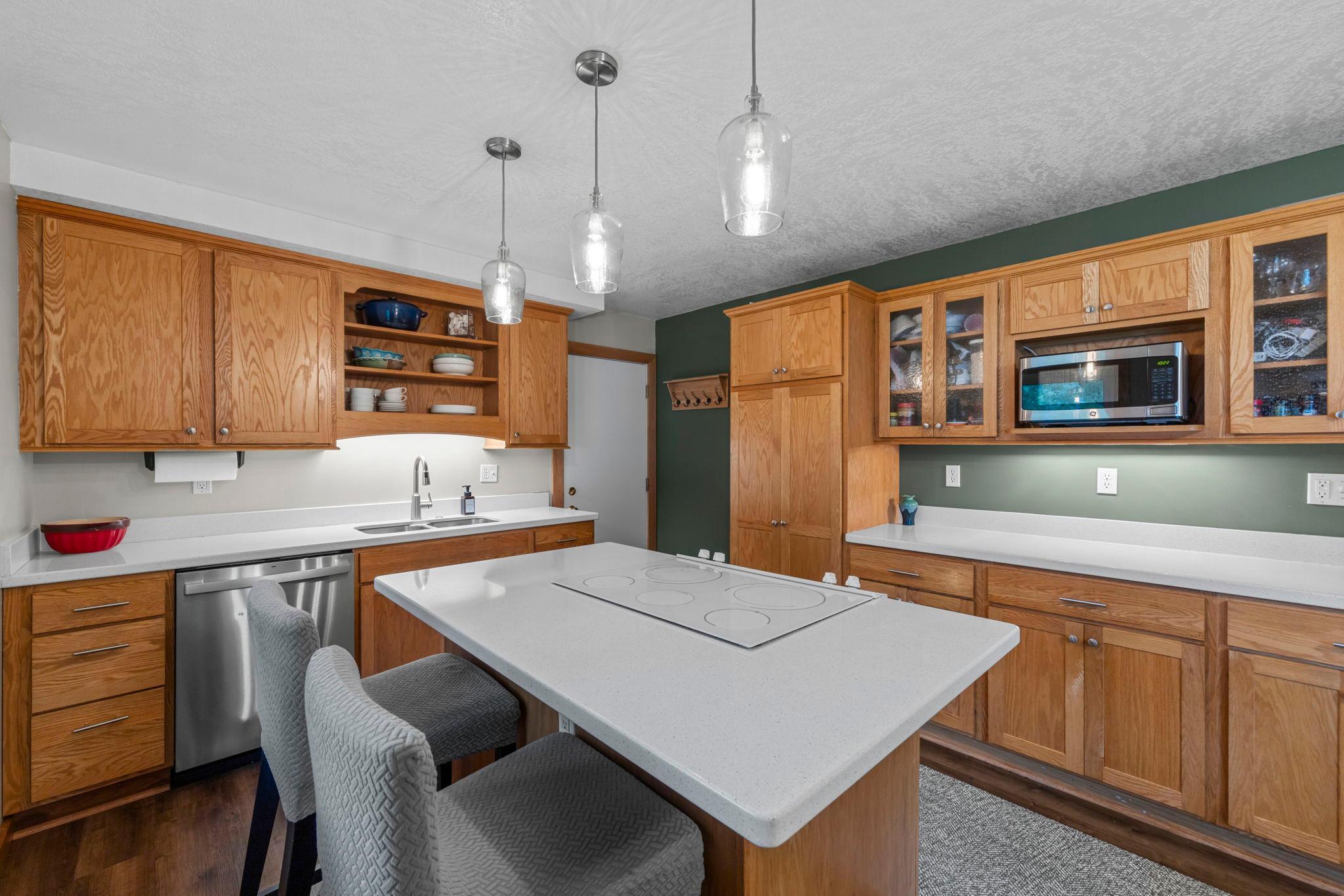 Generous cabinet space; stainless dishwasher