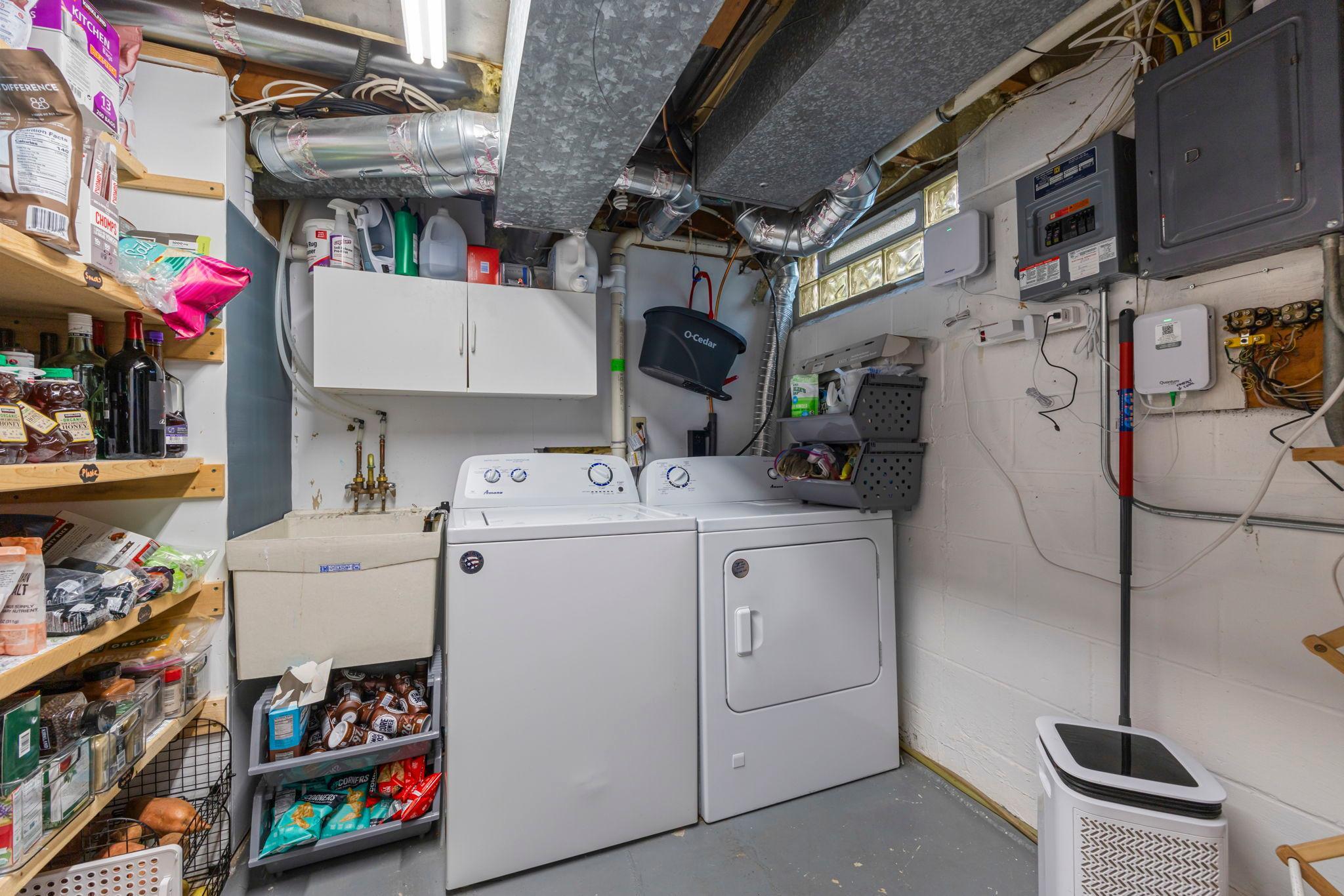 Laundry; storage & utility room in lower level