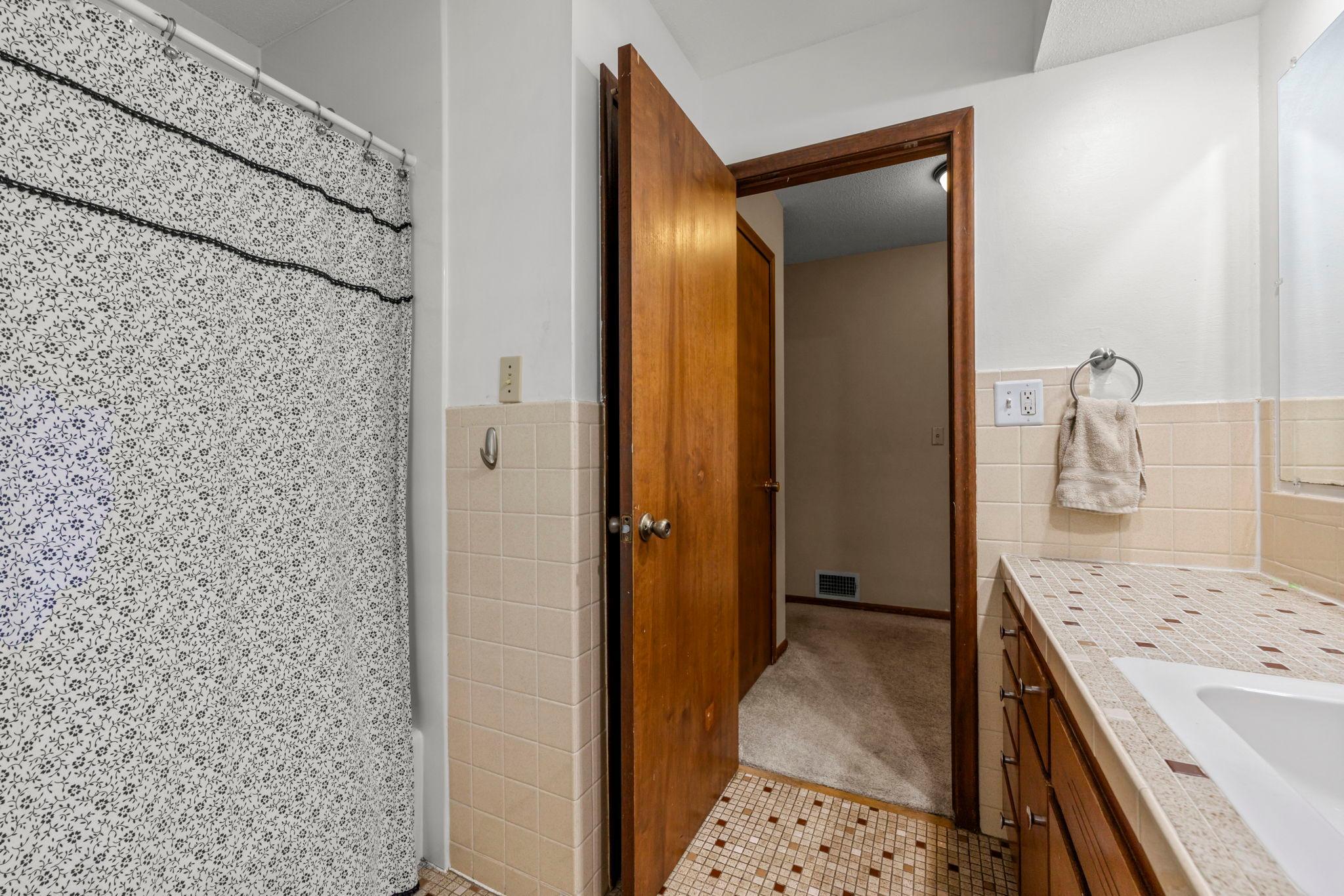 Linen closet & full tub