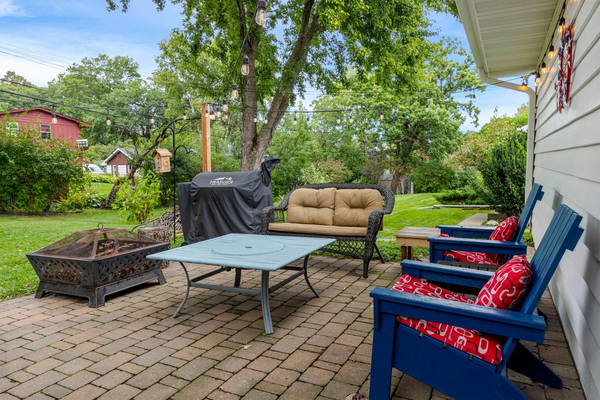 Paver patio behind garage