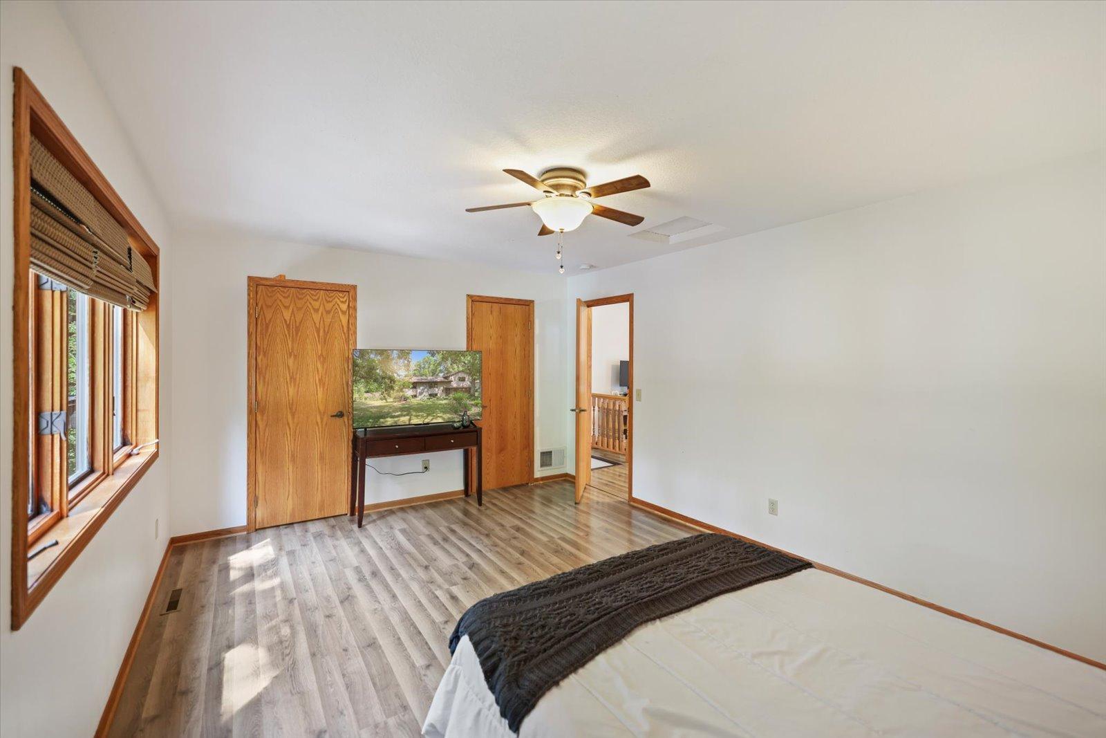 Spacious Primary Bedroom with dual walk-in closets