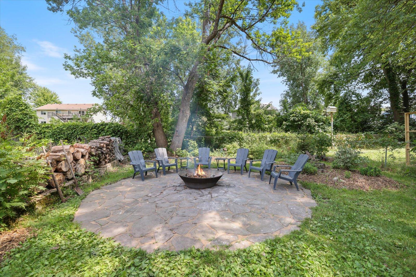 Natural flagstone firepit with an iron fire pit that can handle the heat!