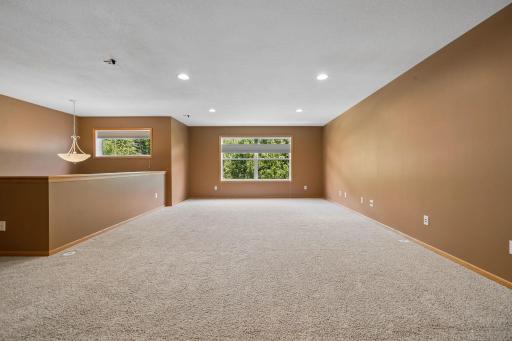 Look At This Open & Airy Loft That Can Be Used As A Family Room