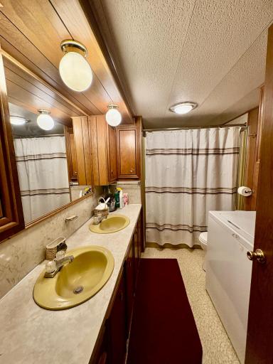 Bathroom with washer and dryer