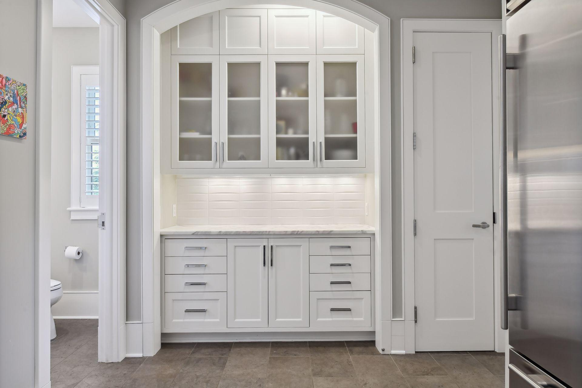 A handy pantry area in the hall connecting the dining room to the kitchen comes in handy when entertaining