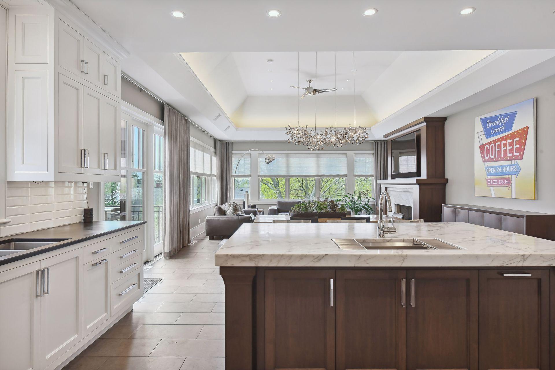 The kitchen flows into a main floor family room