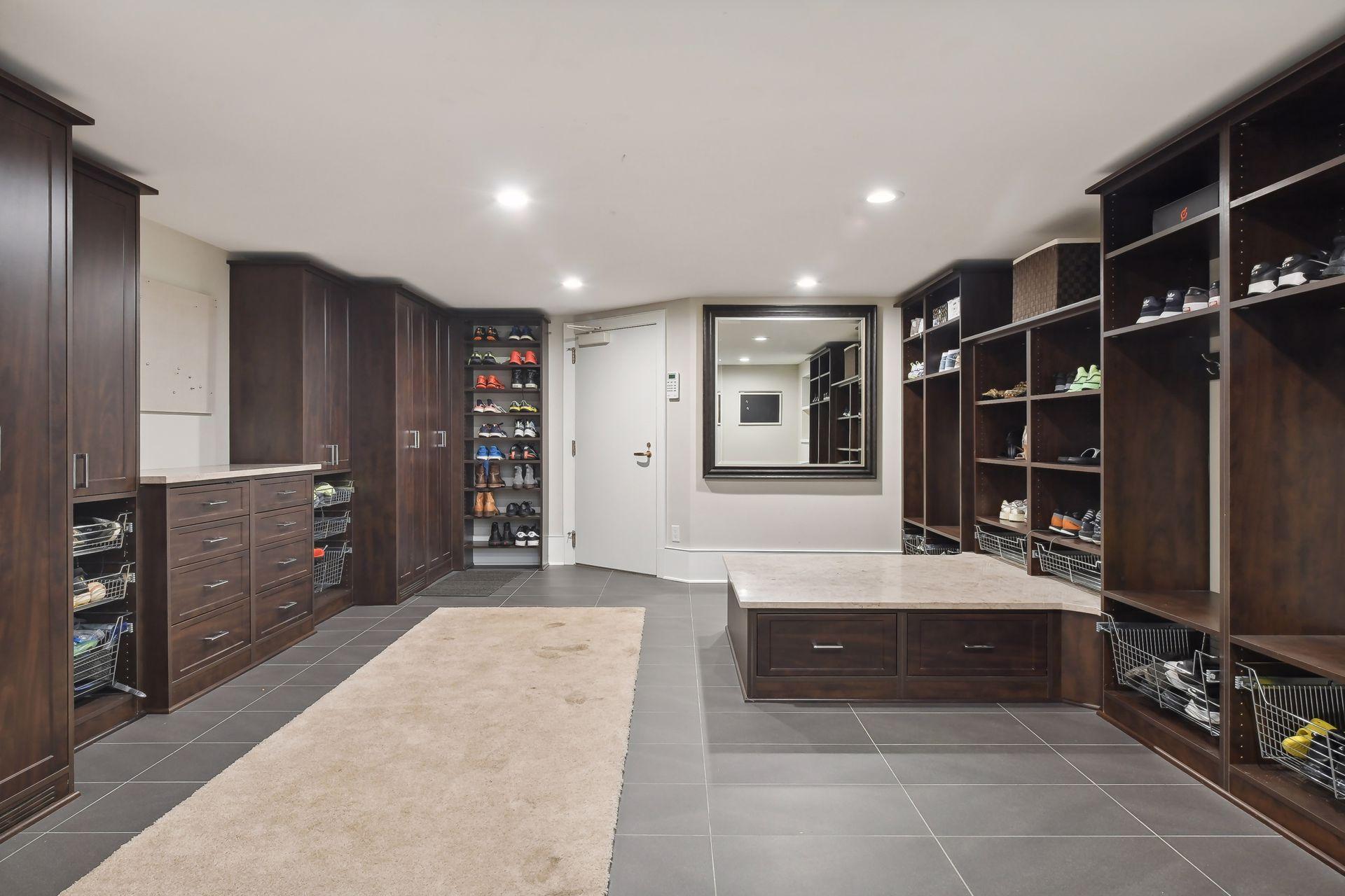 Now this is a mud room that will keep everyone's outer wear, backpacks and totes, plus sports equipment organized