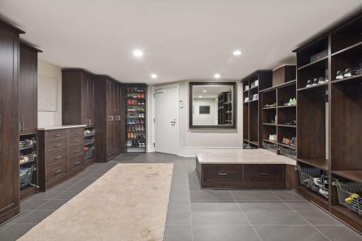 Now this is a mud room that will keep everyone's outer wear, backpacks and totes, plus sports equipment organized
