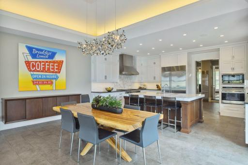 A unique floating buffet serves multiple purposes of serving space and storage
