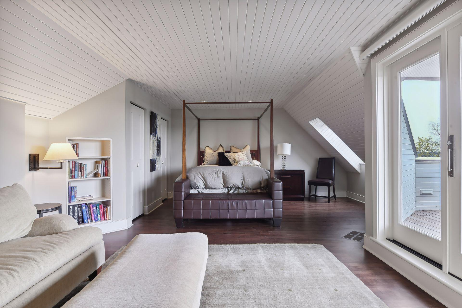 BR #5 is quite large and includes a private balcony with views of Lake Harriett