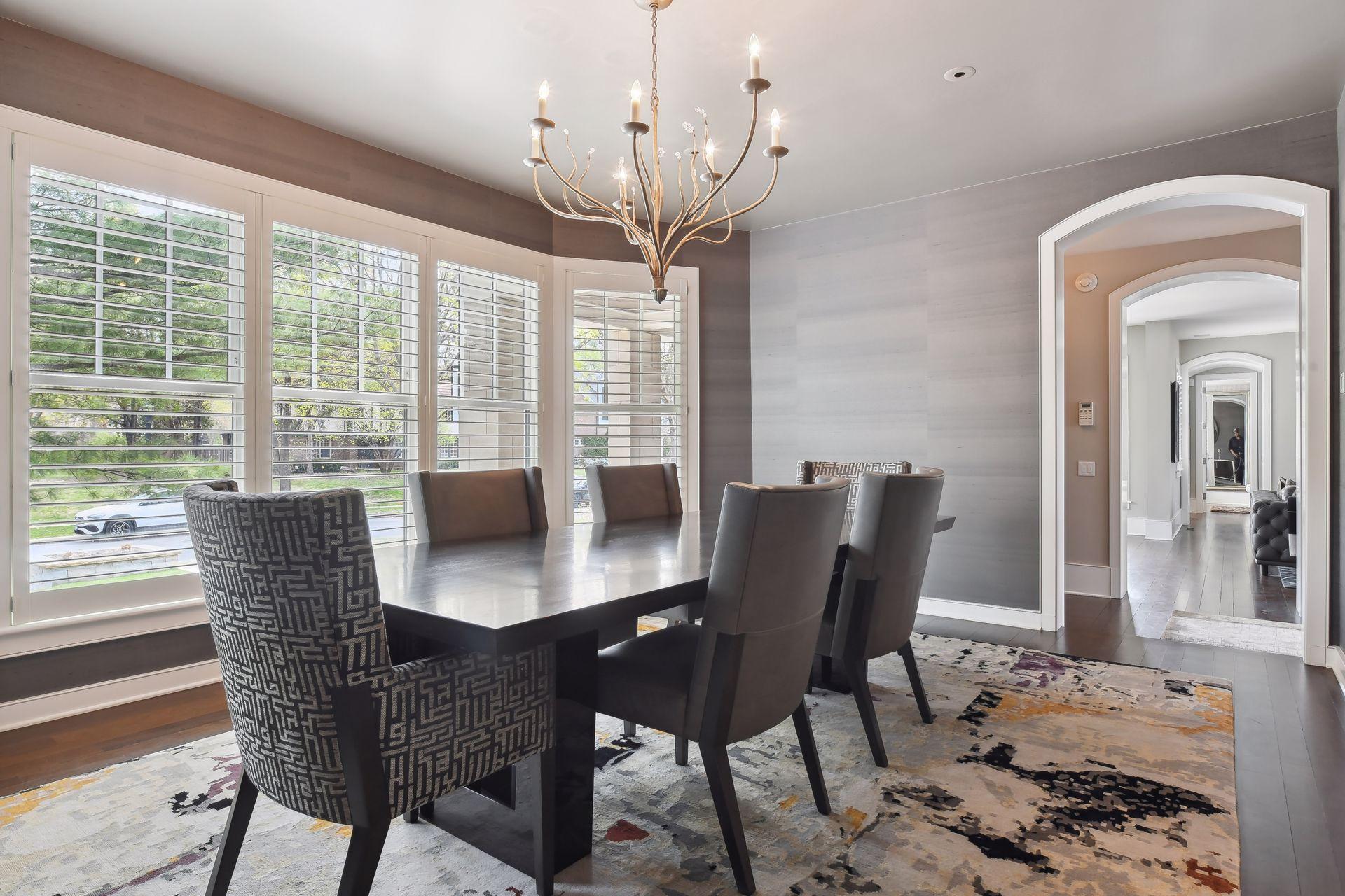 The dining room is just steps away from both the formal living room and kitchen