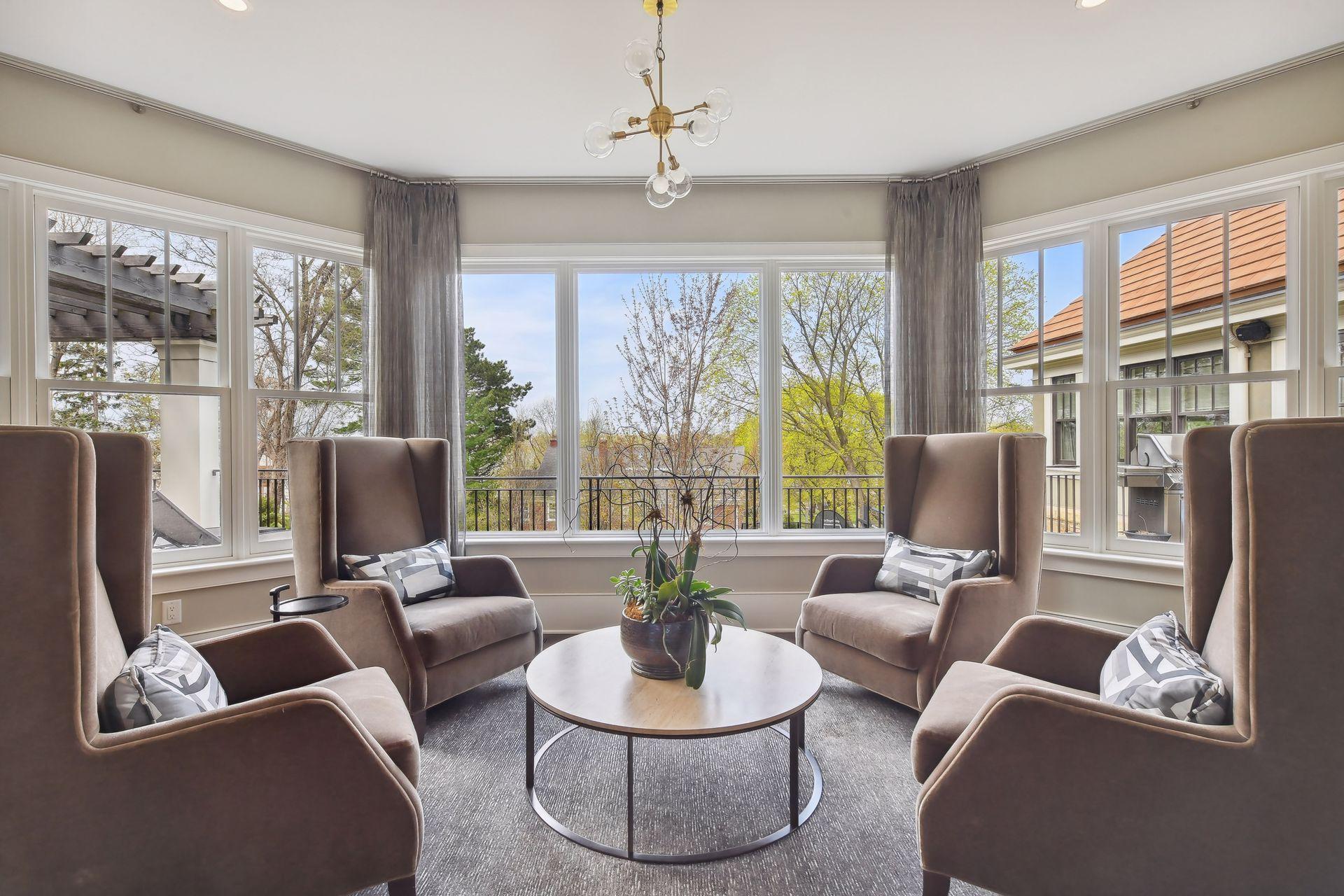 A sitting area found just off the living room provides an intimate area for conversation