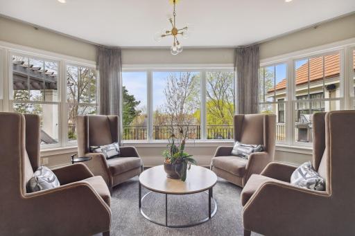 A sitting area found just off the living room provides an intimate area for conversation
