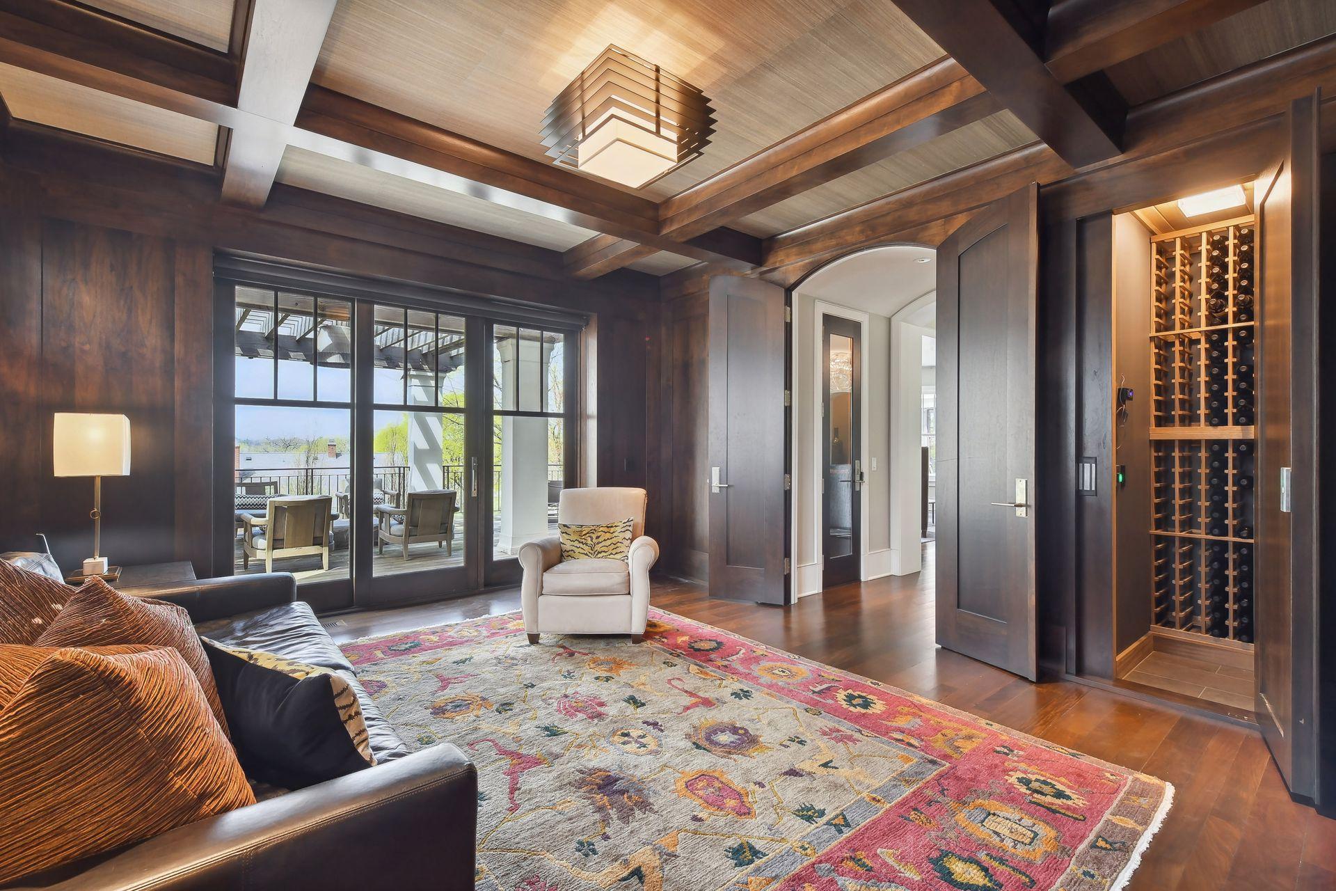 A hidden wine room is an added surprise in this space