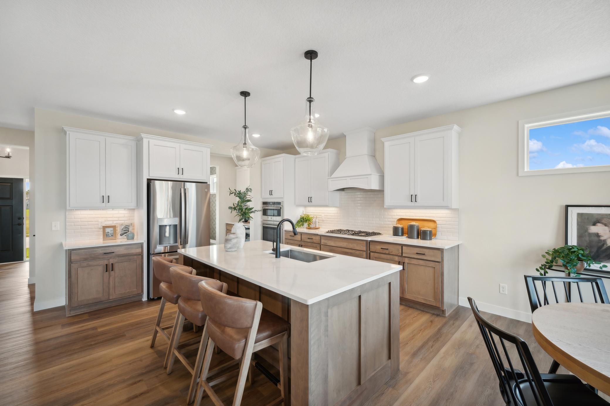 Photo is of Former Model Home. See Sales Consultant for Specific Colors and Options!