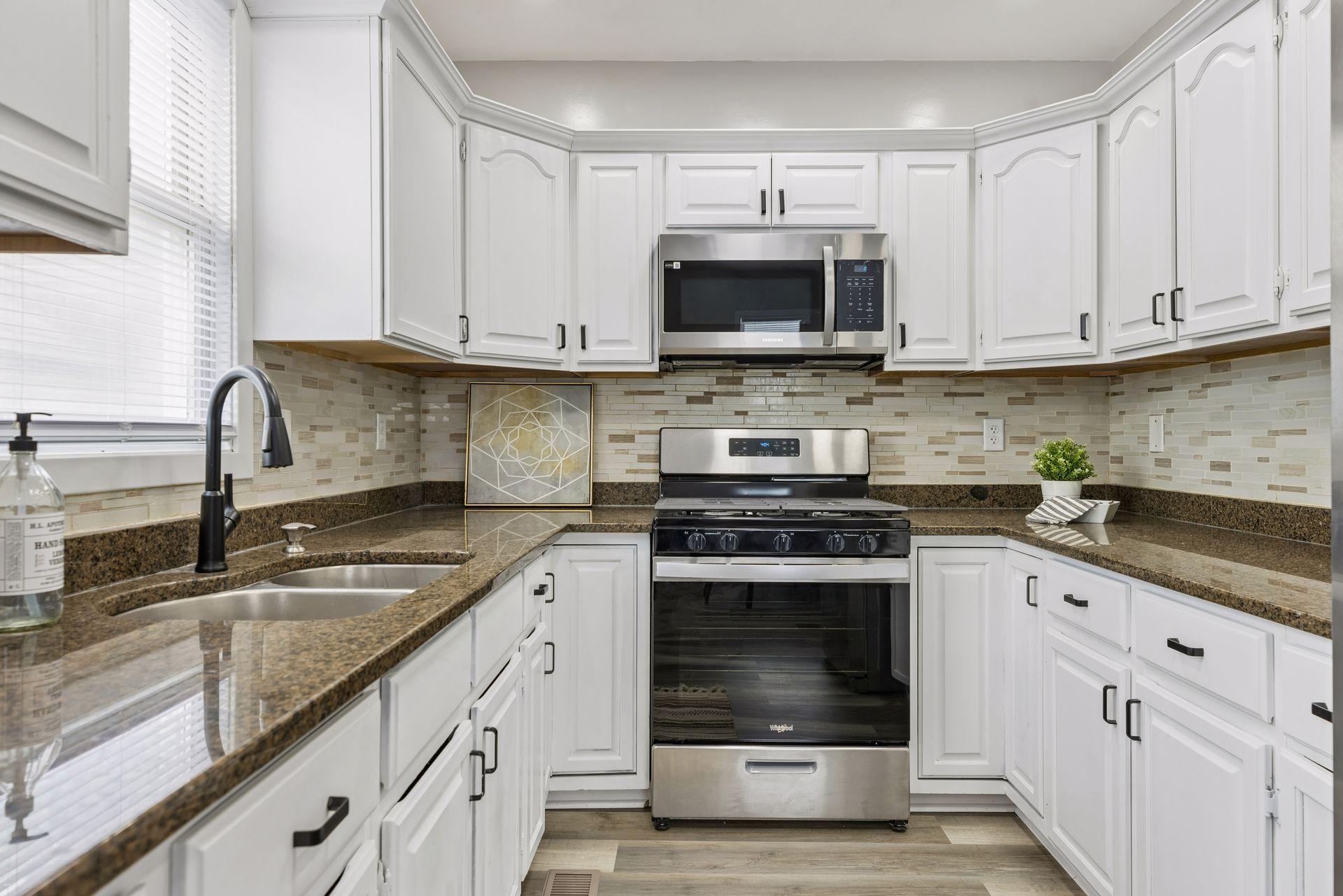 Updated kitchen with new stainless steele appliances
