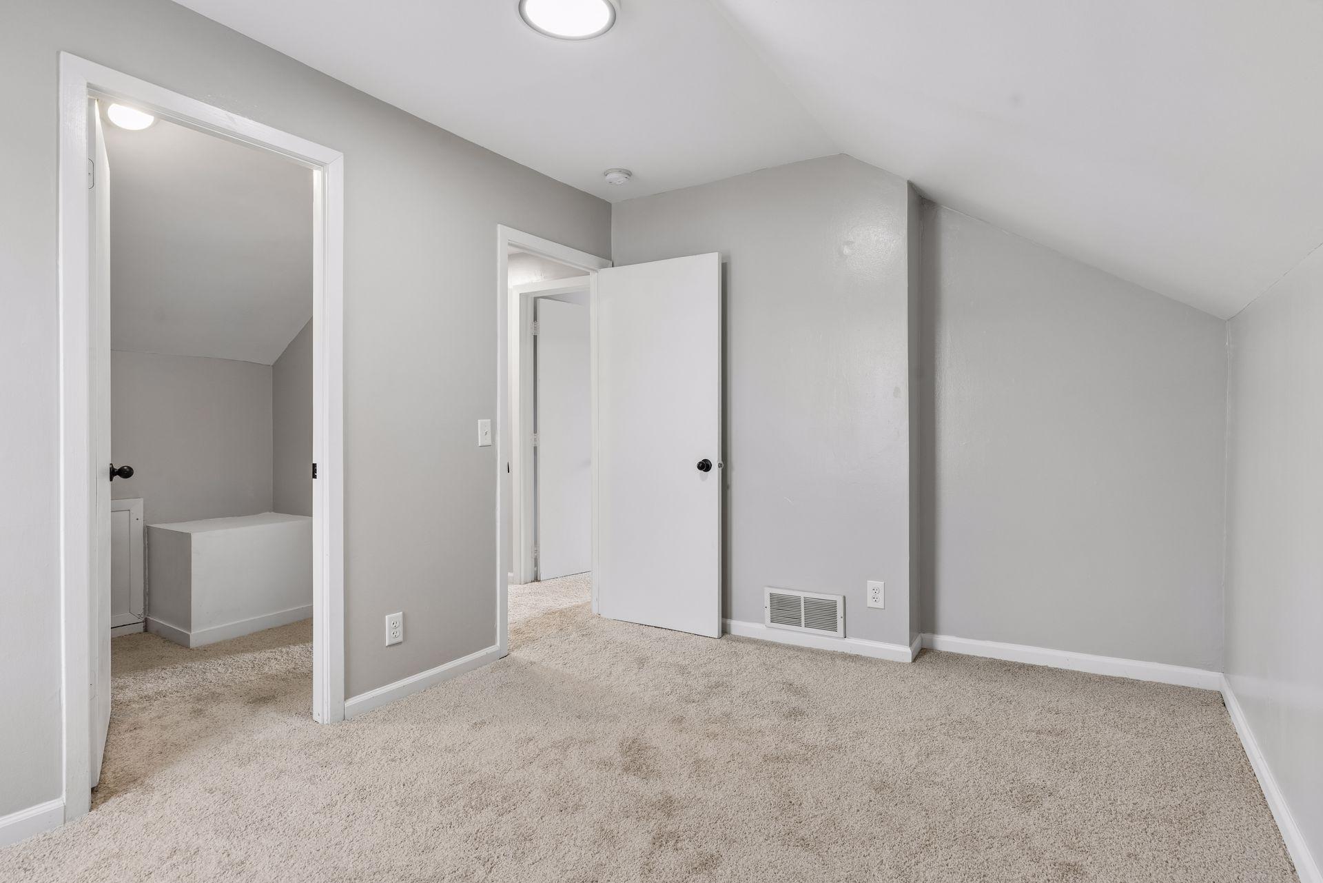 Upper level bedroom with walk-in closet