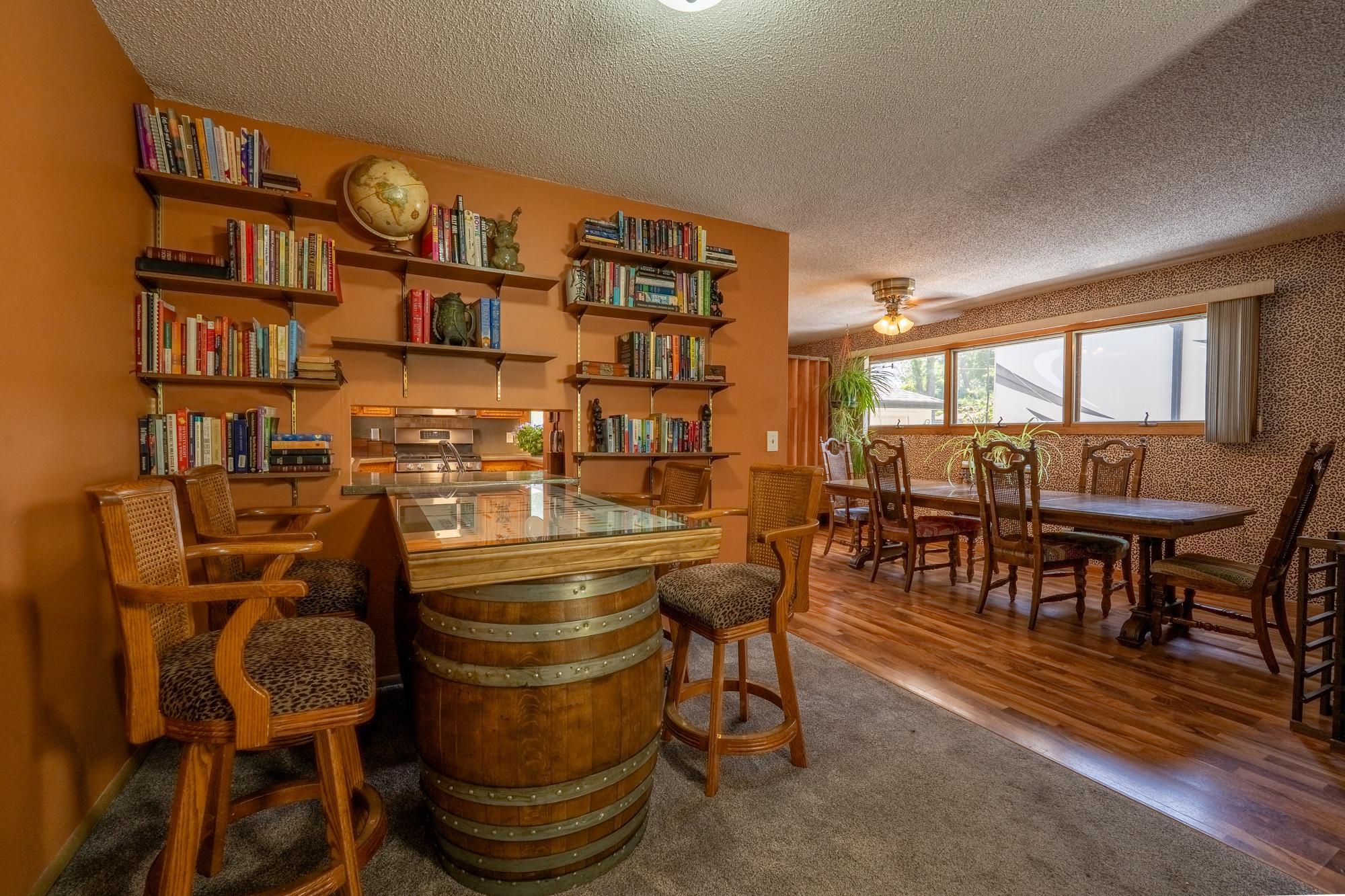 This space right off the living room and next to the formal dining room is technically an informal dining area they could be used as a space to play games, a great library or even a Home Office space depending on your needs