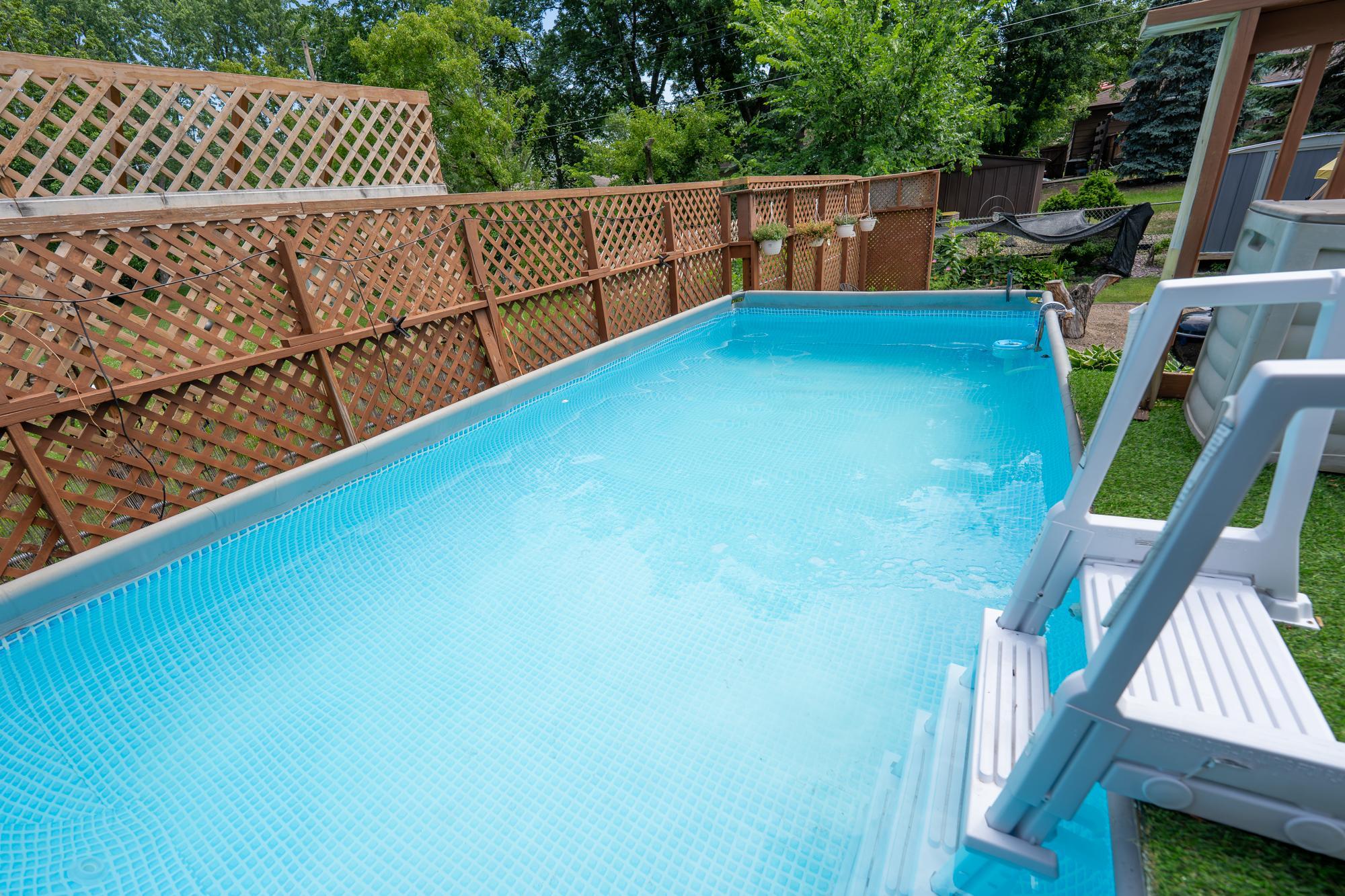 Enjoy this beautiful above ground pool that's built into the deck on those hot summer days. It's very easy and inexpensive to care for and you will have hours of fun
