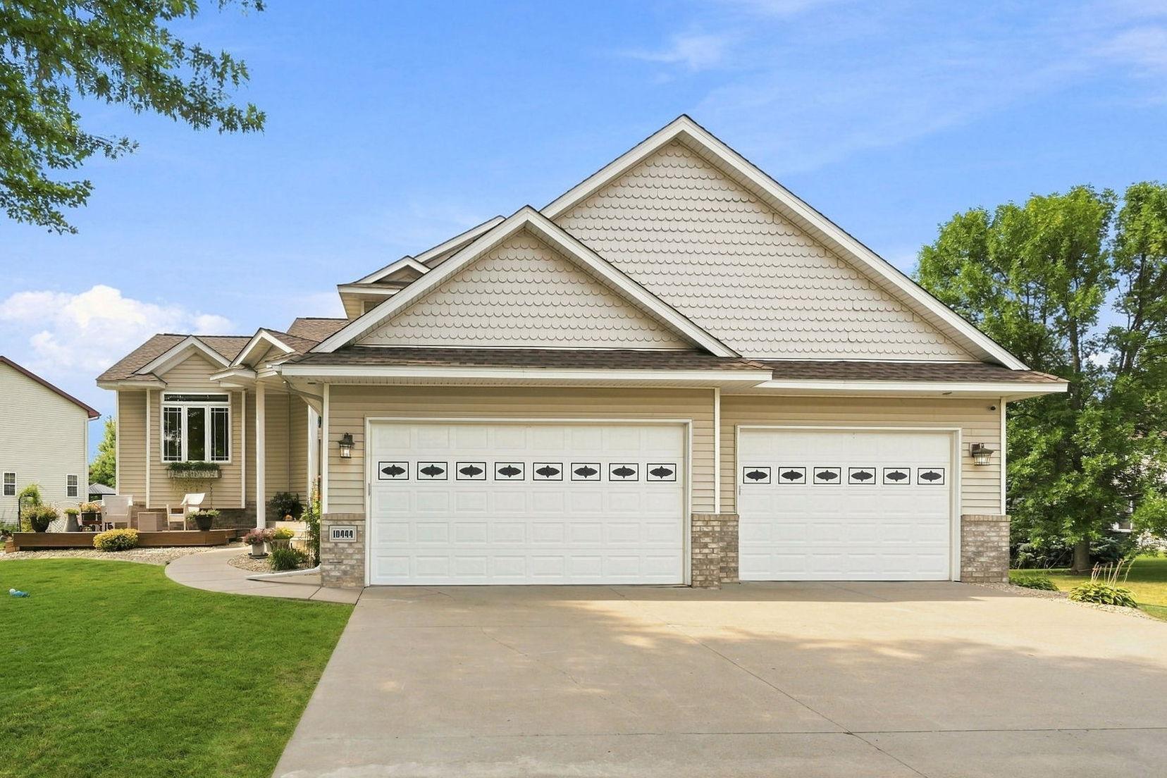 Cement driveway and extra-large 3 car garage