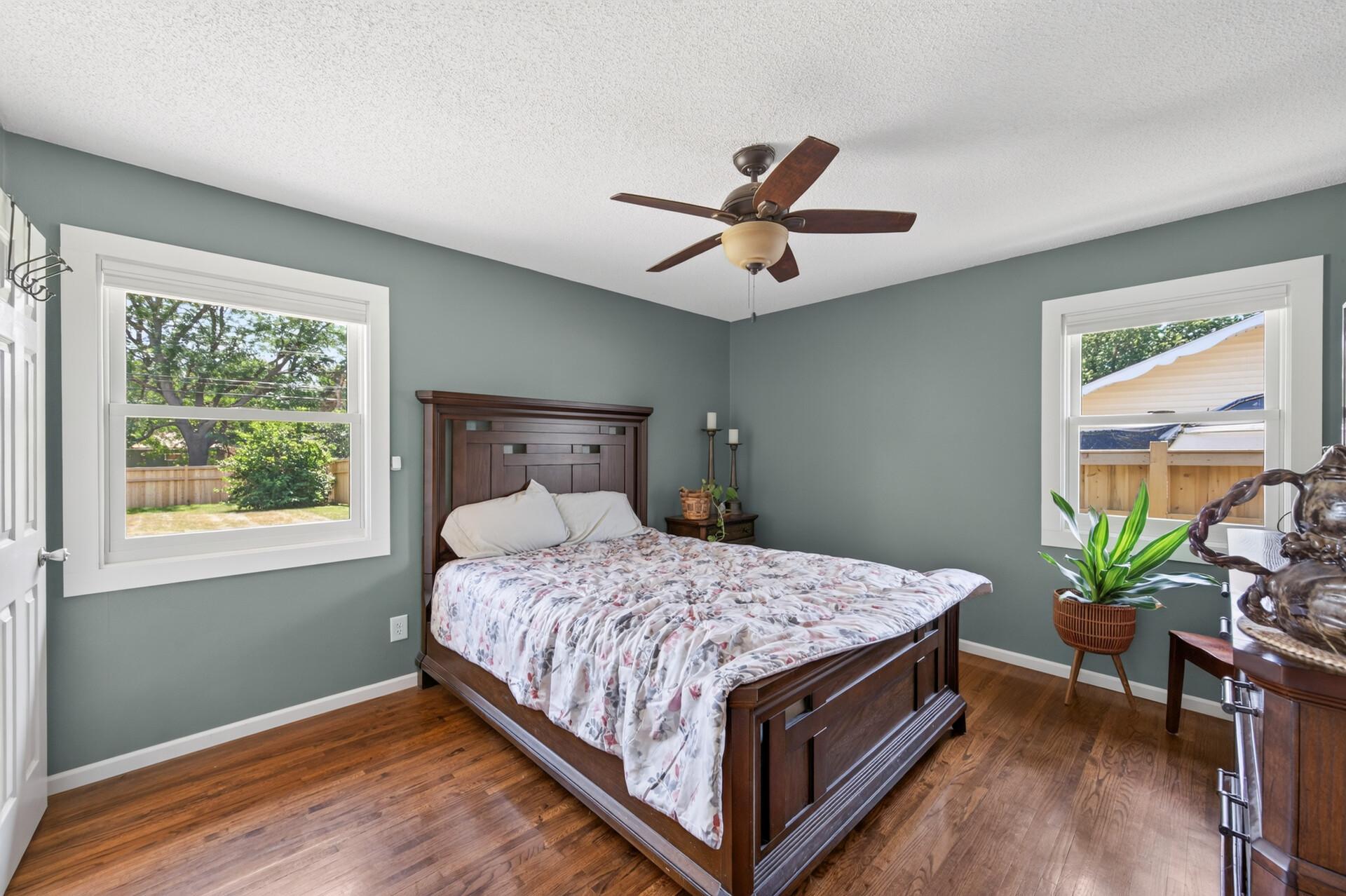 Main floor primary bedroom with 1/2 bath