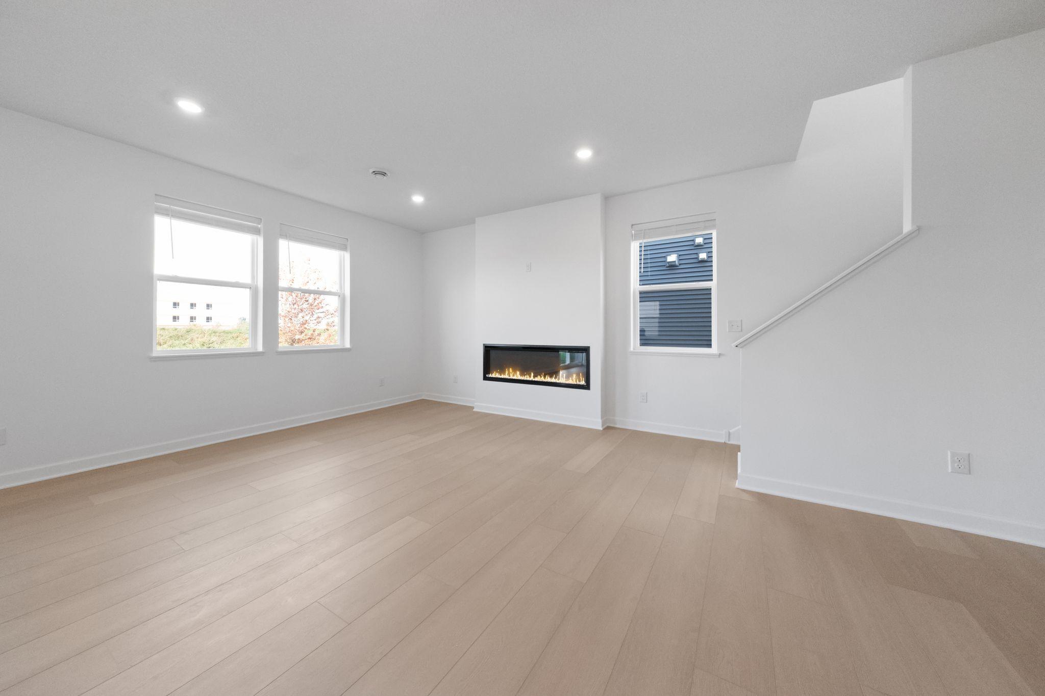 (Photo of a very similar home, actual finishes may vary)