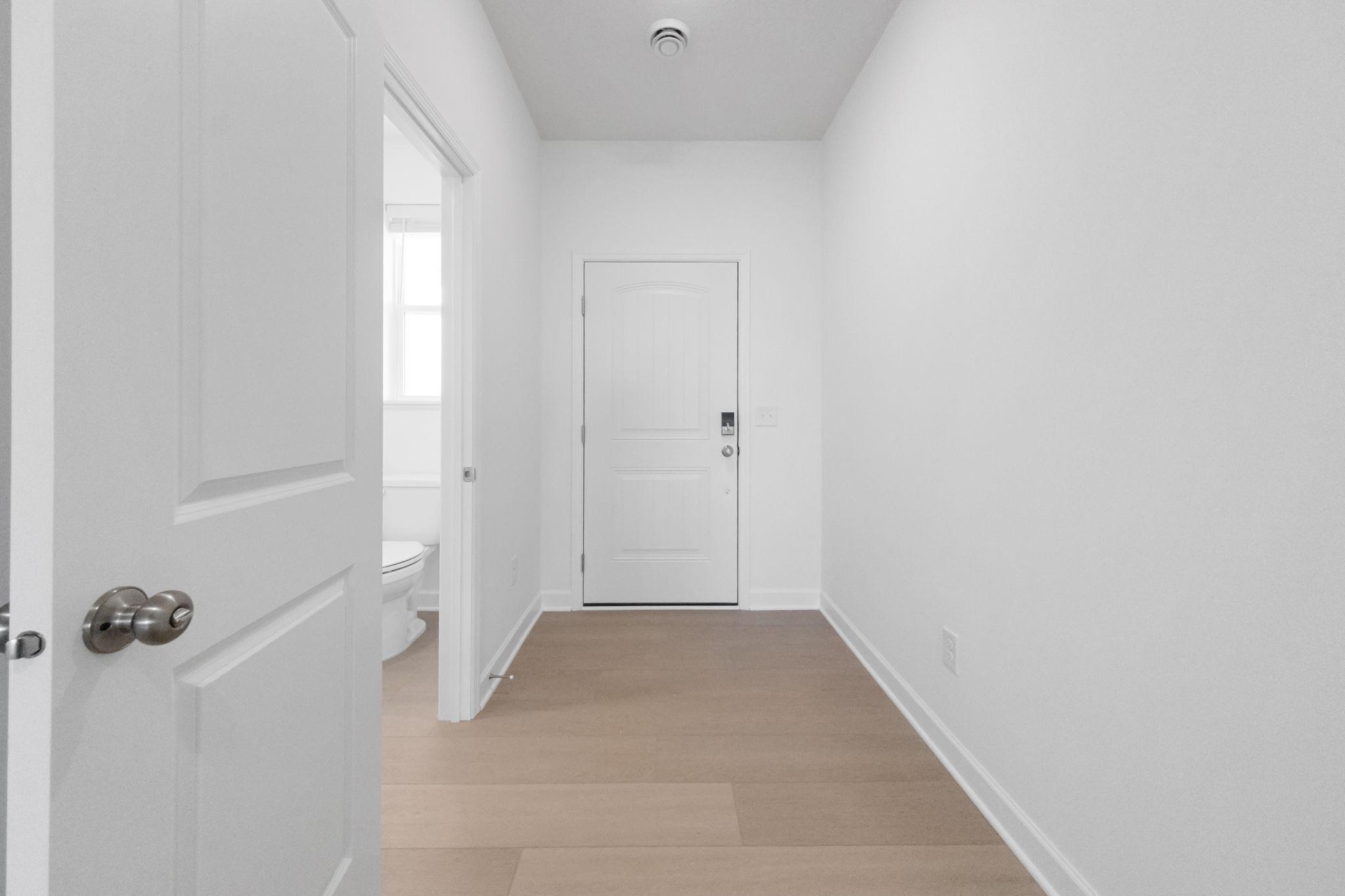(Photo of a very similar home, actual finishes may vary)