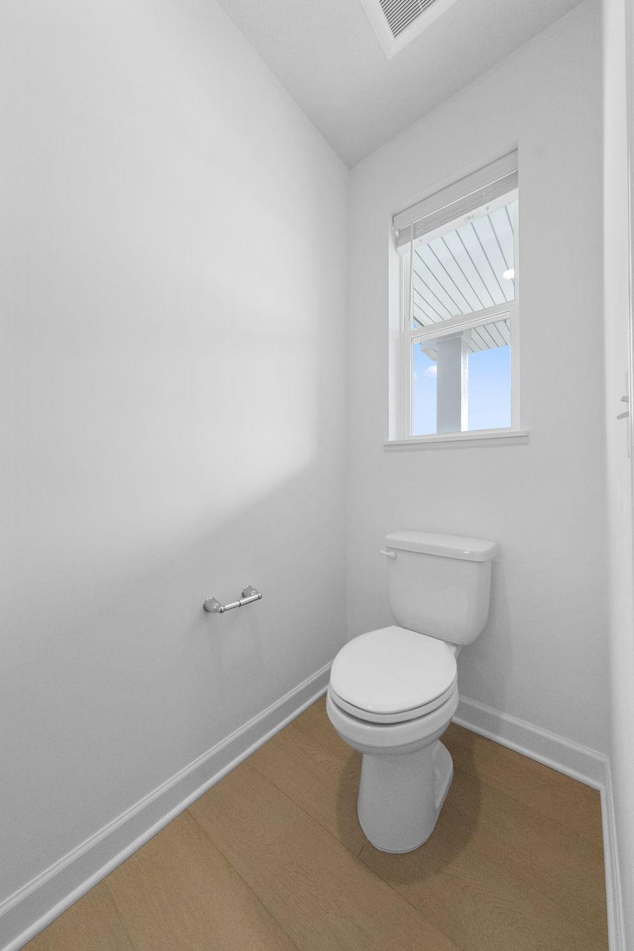 (Photo of a very similar home, actual finishes may vary)