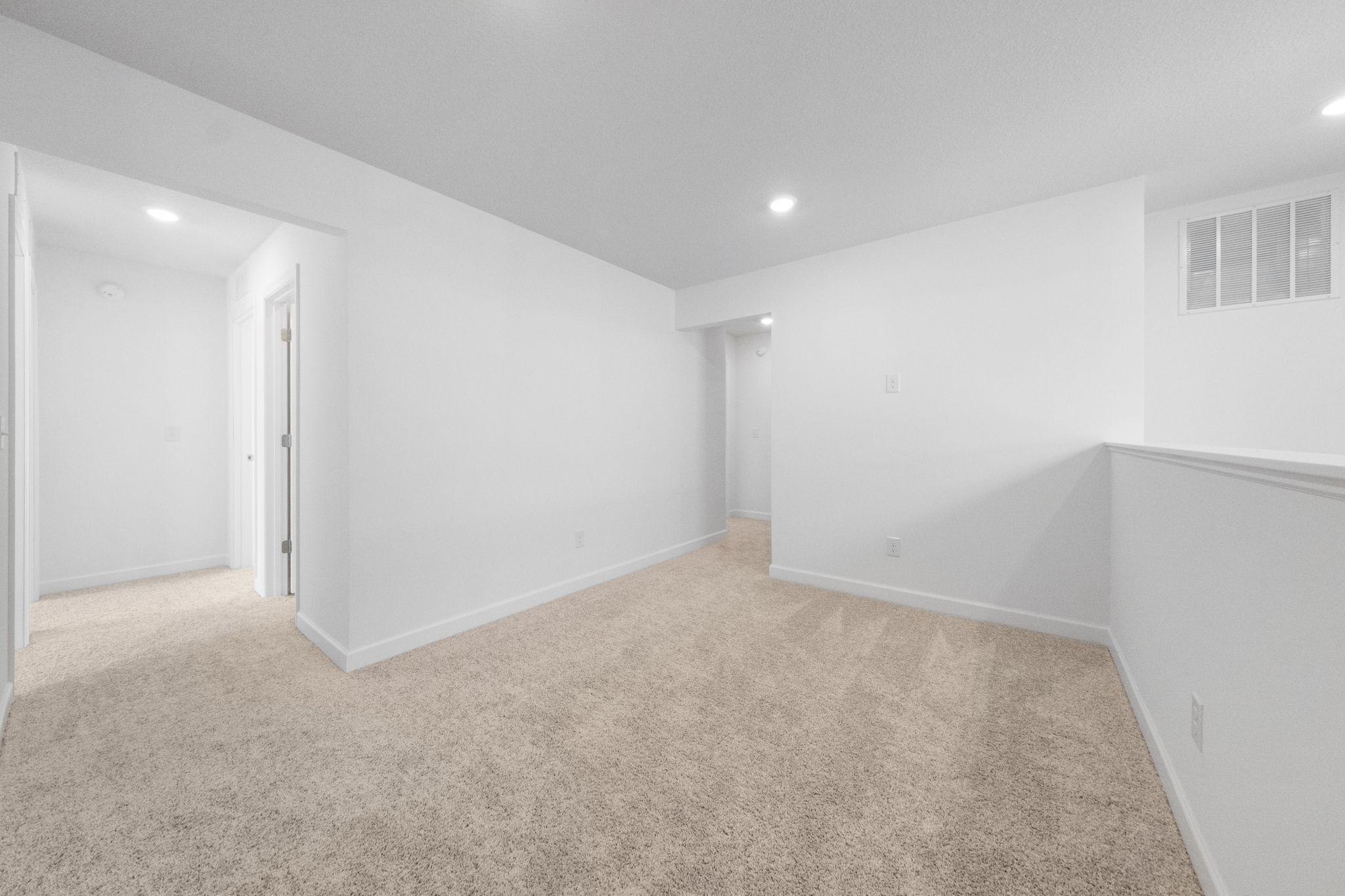 (Photo of a very similar home, actual finishes may vary)