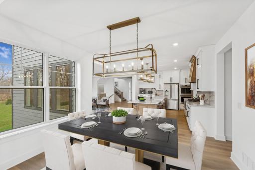 (Photo of an inventory home, actual homes finishes will vary) Enjoy a meal in the dining room!