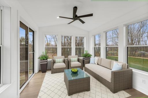 (Photo of an inventory home, actual homes finishes will vary) The four season porch.