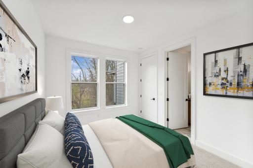 (Photo of an inventory home, actual homes finishes will vary) The main level features a bed and bath - perfect as a guest suite.
