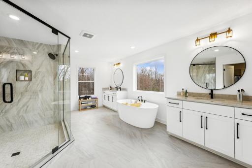 (Photo of an inventory home, actual homes finishes will vary) Enjoy separate vanities!