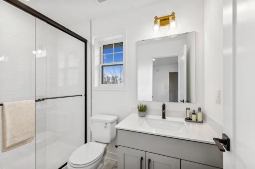 (Photo of an inventory home, actual homes finishes will vary) The en-suite bath.