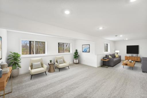 (Photo of an inventory home, actual homes finishes will vary) Enjoy another spot to gather - the lower level rec room.