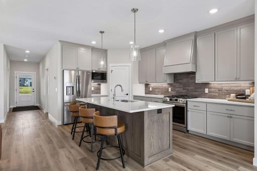 Chef's kitchen with stainless steel appliances
