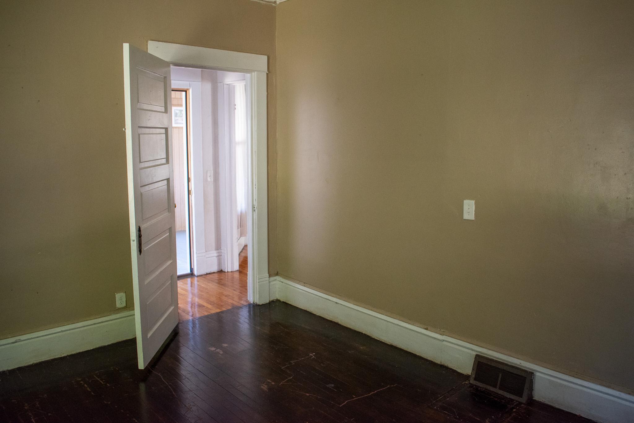 Main Bedroom across from front door/porch.