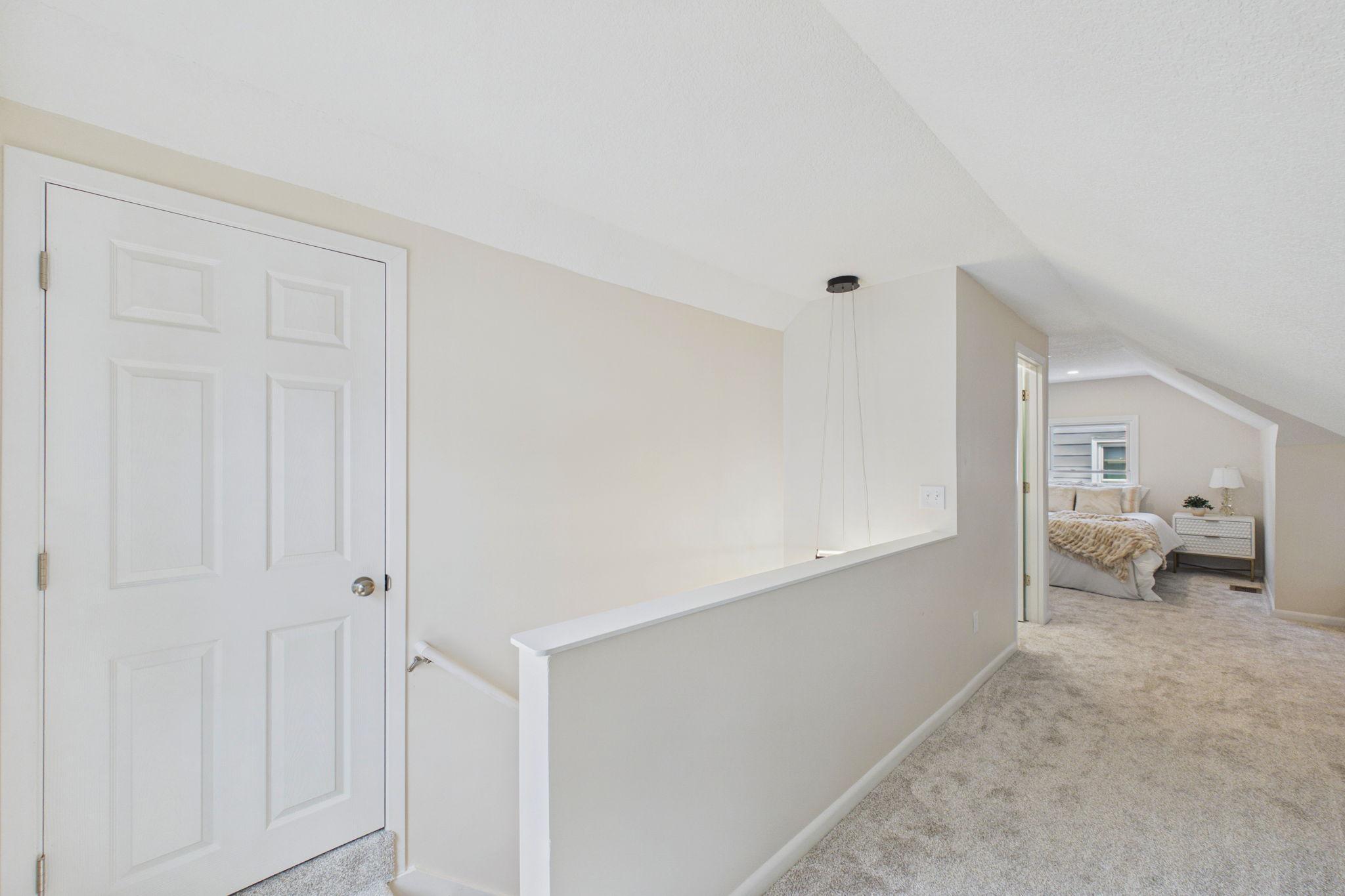 Upstairs is the primary suite.