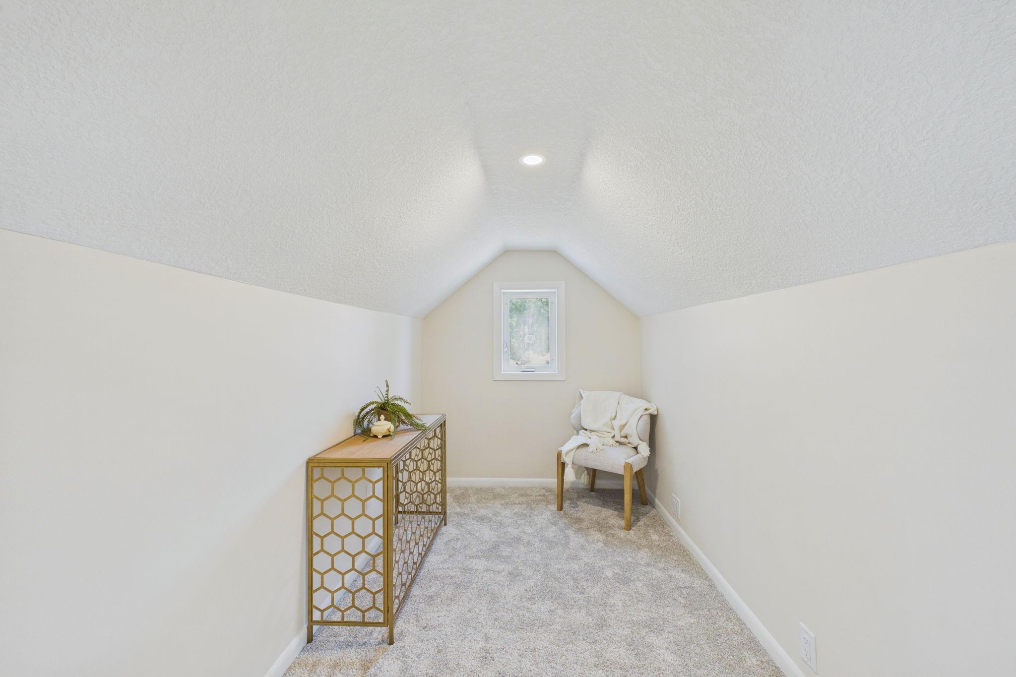 This is a great space to curl up and read a book, or it could be a walk in closet or office.