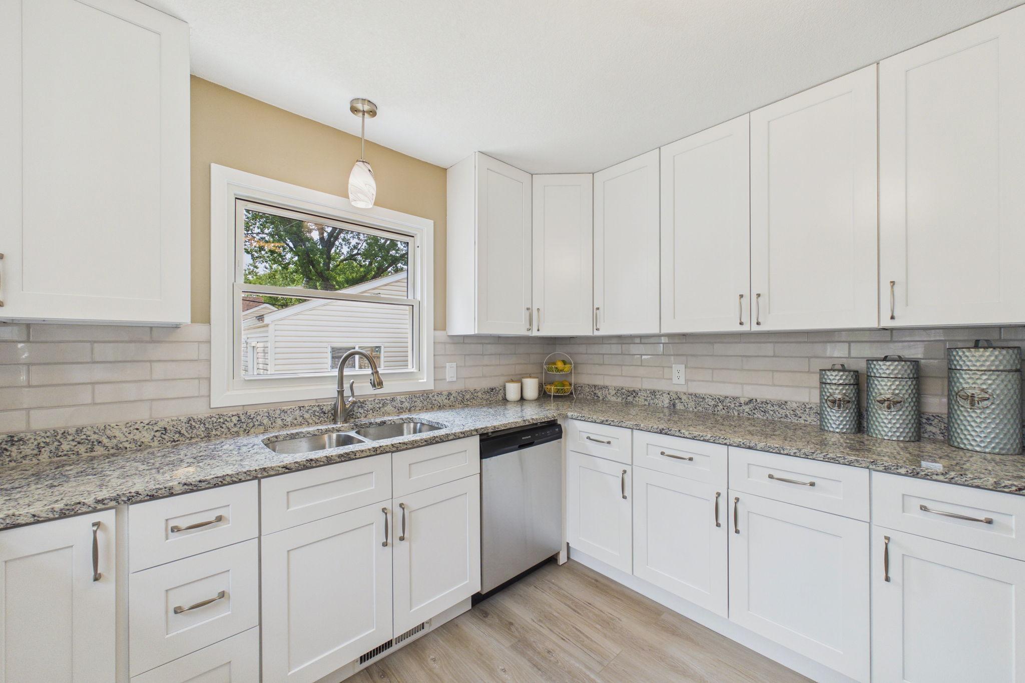New cabinets and granite counters,