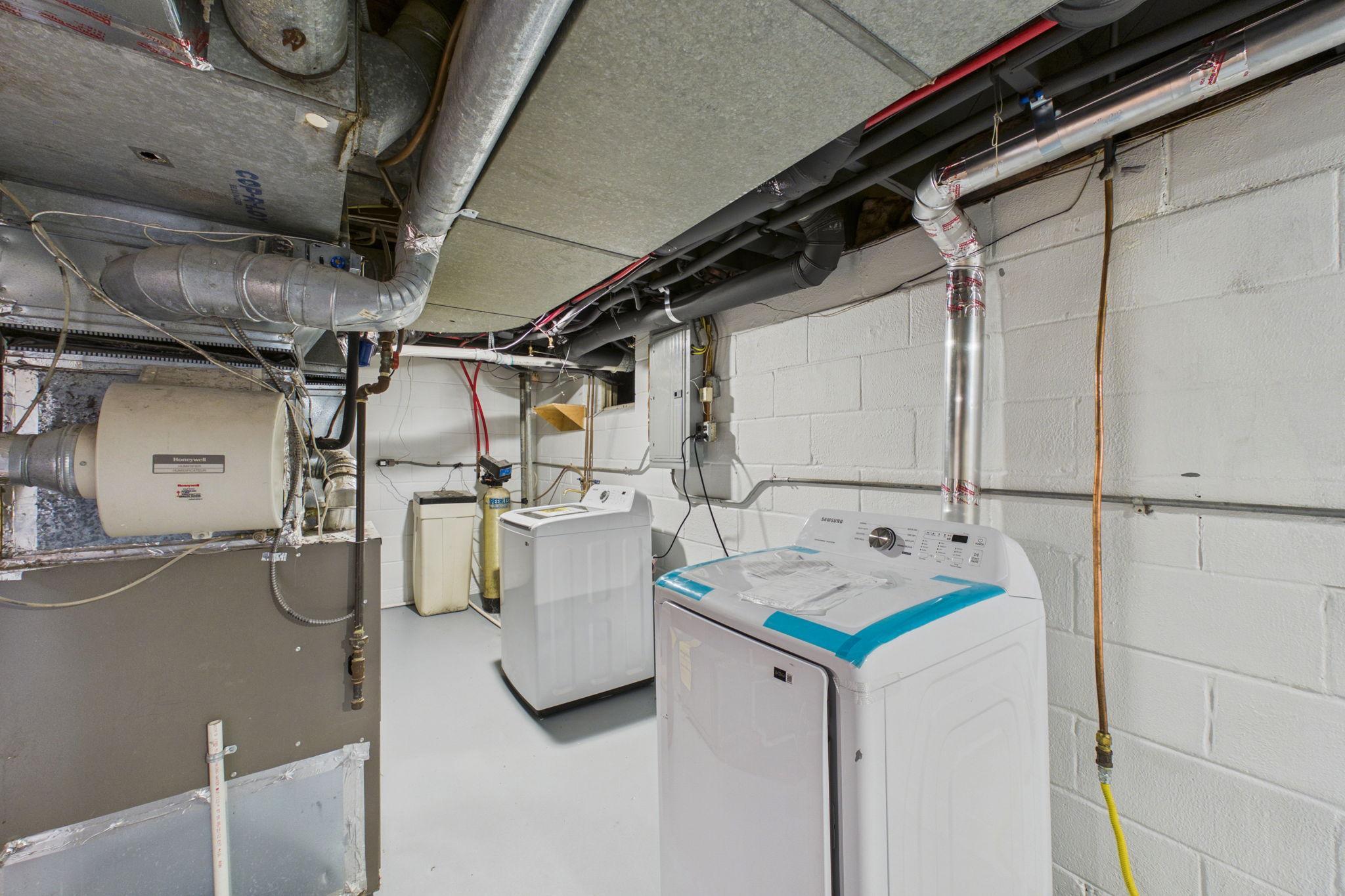 New washer and dryer in lower level laundry.